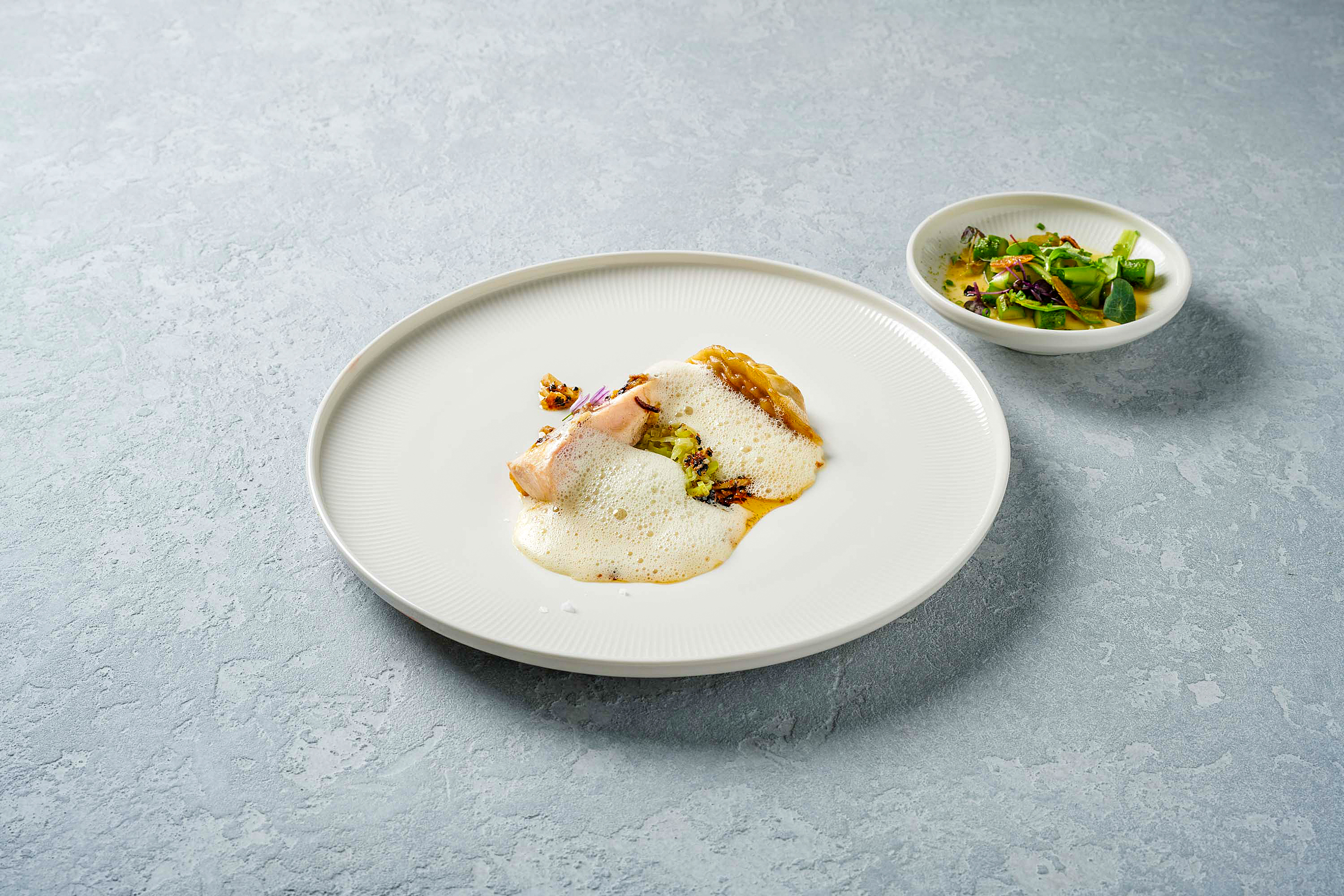 Das Siegermenü: pouletbrust. beurre noisette velouté. dim-sum. rahyu. lauch. 